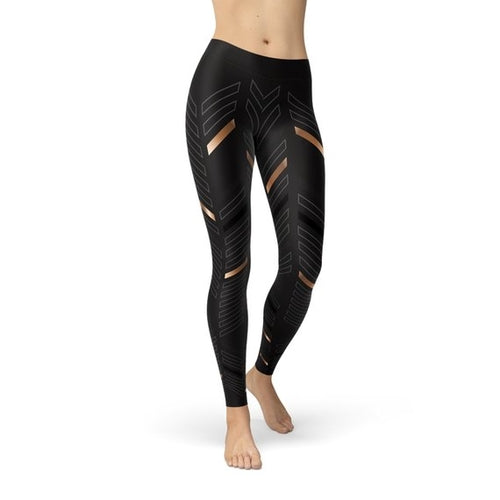 Black leggings with geometric patterns on a white background